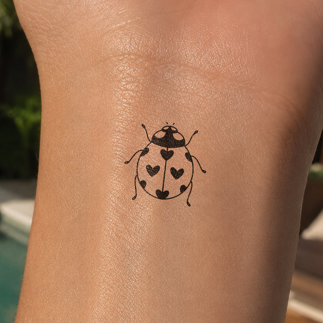 Marienkäfer Tattoo